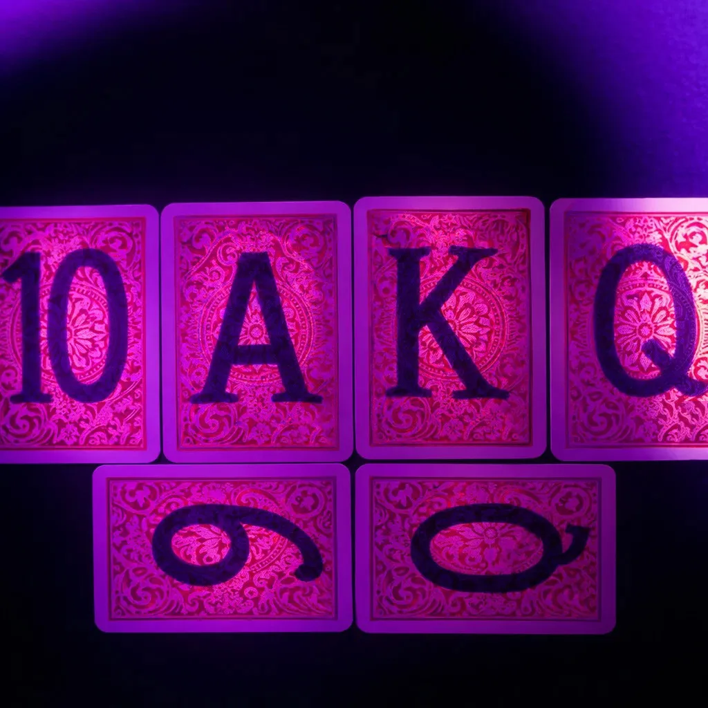 Luminous invisible marks on Copag 1546 cheating poker cards revealed with contact lenses